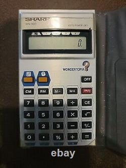 SUPER RARE Vintage SHARP WN-100 WONDERTOPIA Electronic Game Calculator IT WORKS