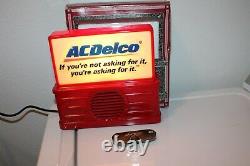Vintage Chevrolet key holder & AC DELCO Radio nos