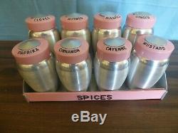 Vintage aluminum Kromex spice rack with 8 spices pink tops Rare