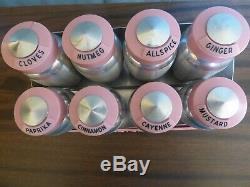 Vintage aluminum Kromex spice rack with 8 spices pink tops Rare
