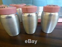 Vintage aluminum Kromex spice rack with 8 spices pink tops Rare