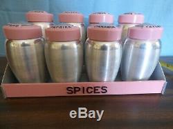 Vintage aluminum Kromex spice rack with 8 spices pink tops Rare